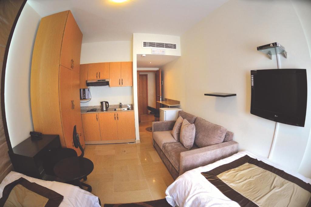 Bliss 3000 Furnished Studios Bejrút Szoba fotó