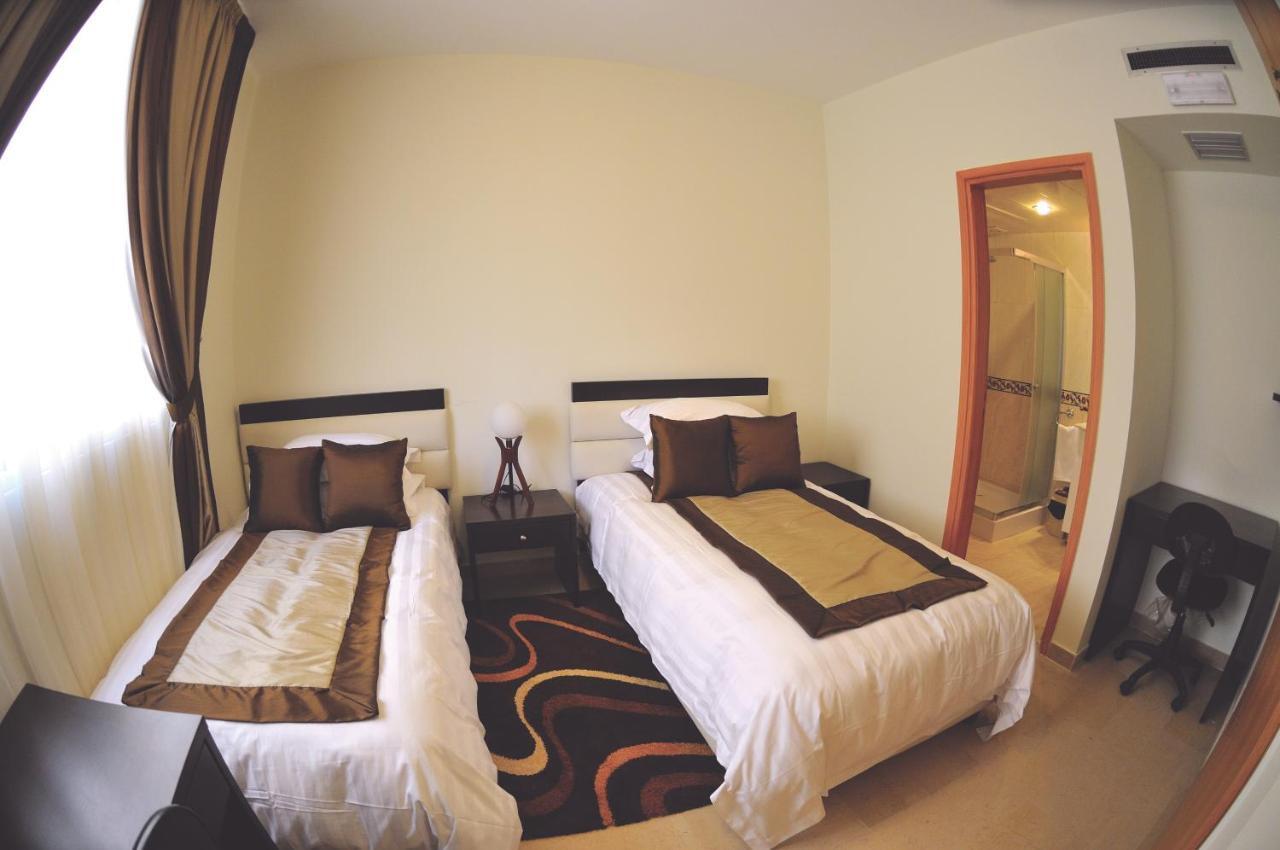Bliss 3000 Furnished Studios Bejrút Szoba fotó